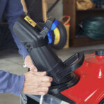 Man assembling a Toro Single Stage Snowblower